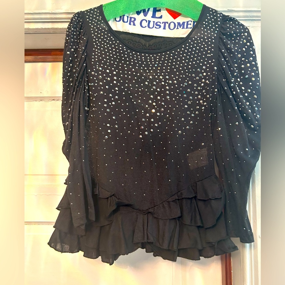 Black peplum shirt with black stone